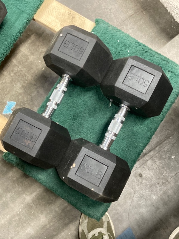 Photo 1 of 2x 50 lb dumbbells