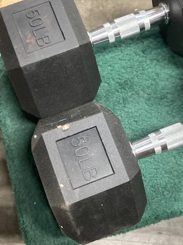 Photo 2 of 2x 50 lb dumbbells