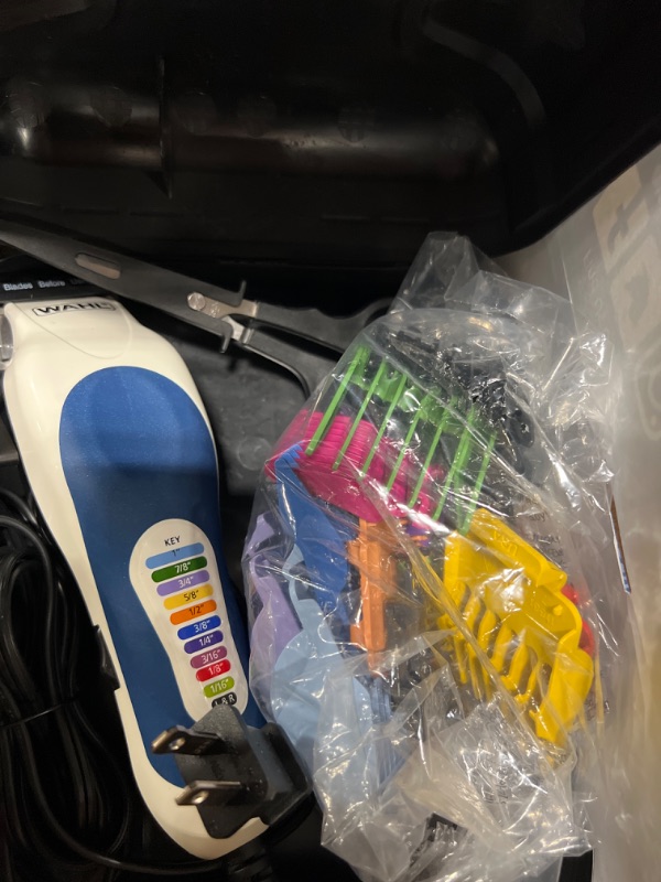 Photo 1 of Wahl Clipper USA Color Pro Complete Haircutting Kit with Easy Color Coded Guide Combs - Corded Clipper for Hair clipping & Grooming Men, Women, & Children - Model 79300-1001M 1 Count (Pack of 1)