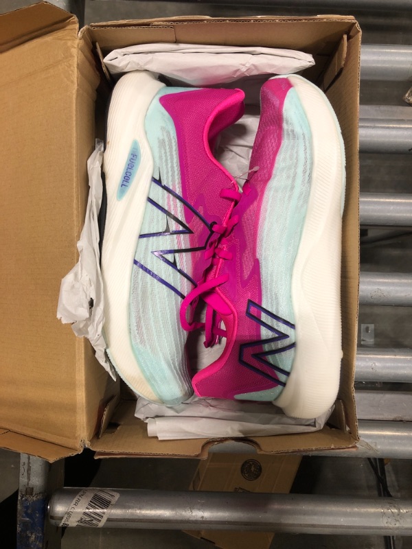 Photo 2 of ****SIMILAR, NOT EXACT***New Balance Women's FuelCell SuperComp Trainer V2 Running Shoe, Ice Blue/Neon Dragonfly, size 9.5 women's