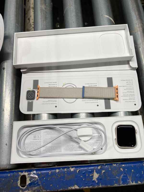 Photo 3 of Apple Watch SE (2nd Gen) [GPS 40mm] Smartwatch with Starlight Aluminum Case with Starlight Sport Loop. Fitness & Sleep Tracker, Crash Detection, Heart Rate Monitor, Carbon Neutral Starlight Aluminum Case with Starlight Sport Loop 40mm Case One Size - fits