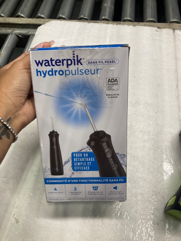 Photo 1 of Waterpik Cordless Pearl Water Flosser Rechargeable Portable Water Flosser for Teeth, Gums, Braces Care and Travel with 4 Flossing Tips, ADA Accepted, WF-13 Black