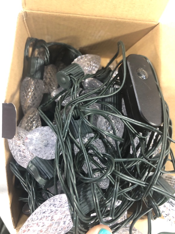 Photo 1 of App Programmable 50 LED 55ft Waterproof RGB Color Changing C9 LED Christmas Lights Indoor Outdoor, Extendable Dimmable Waterproof C9 Christmas String Lights for Tree Patio Easter Christmas Decoration