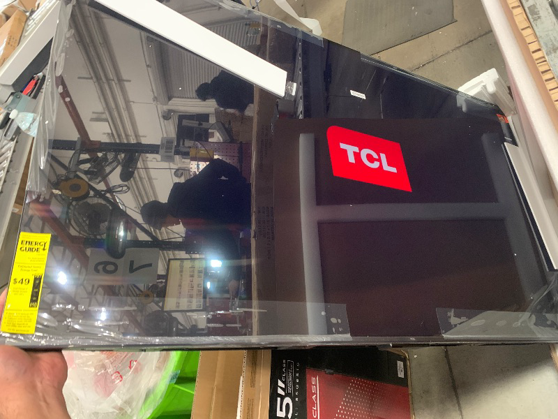 Photo 2 of **LINE THRU SCREEN **TCL 55-Inch Class S5 UHD 4K LED Smart TV with Fire TV (55S551F, 2024 Model), Dolby Vision, HDR PRO+, Dolby Atmos, Alexa Built-in with Voice Remote, Apple AirPlay 2 Compatibility, Streaming Television
