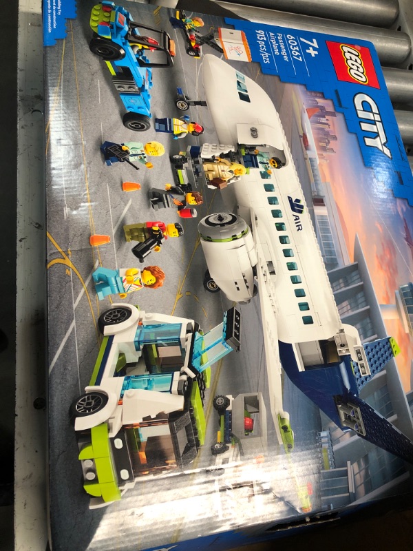 Photo 2 of ***(USED/ MISSING PARTS/ FOR PARTS/ NO RETURNS OR REFUNDS) ***
LEGO City Passenger Airplane 60367 Building Toy Set; Fun Airplane STEM Toy for Kids with a Large Airplane, Passenger Bus, Luggage Truck, Container Loader, and 9 Minifigures