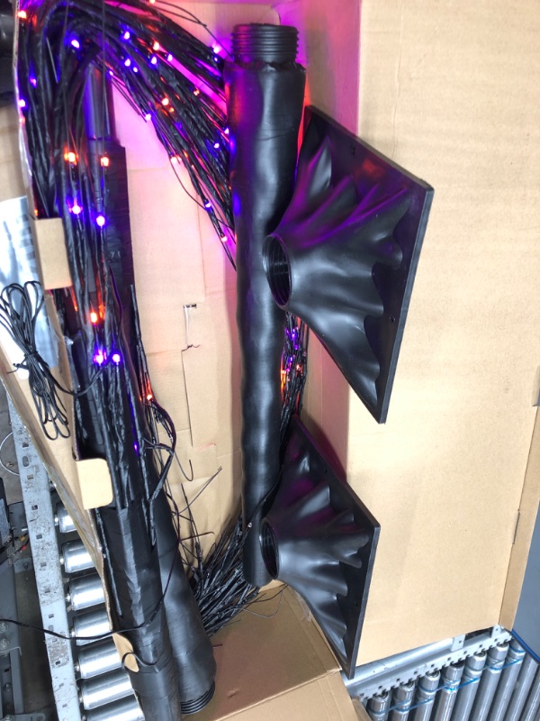 Photo 2 of **Only One  up when plugged in**
2-Pack 6FT Lighted Black Halloween Tree with 288 LED Orange & Purple Lights (Higher Size & Floor Standing), Halloween Decorations Spooky Tree for Indoor & Outdoor, Home Holiday Party