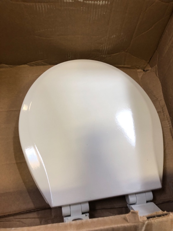 Photo 2 of American Standard Champion 4 Slow-Close Round Closed Front Toilet Seat in White