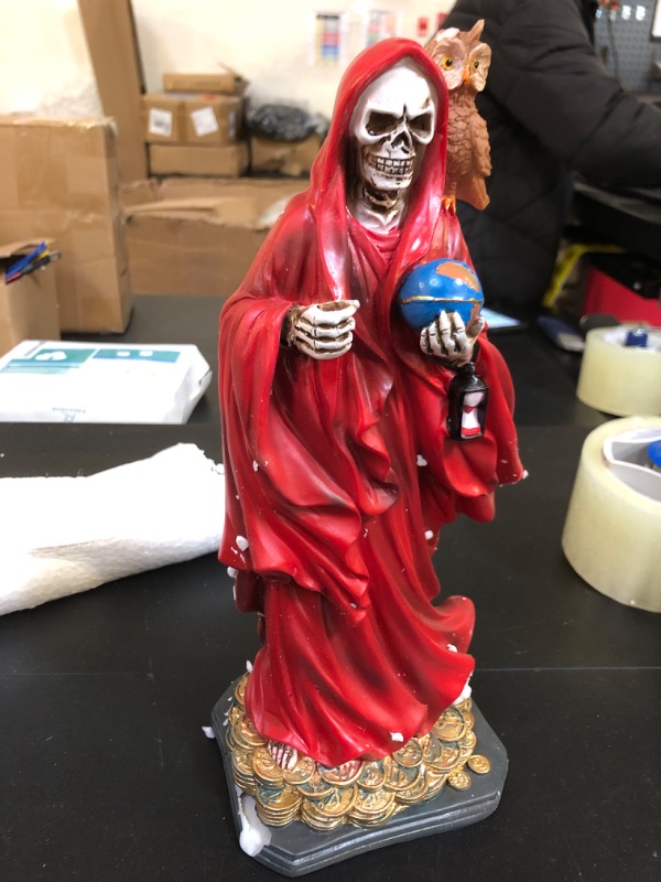 Photo 2 of 12" Santa Muerte Statue | Our Lady of a Holy Death | Gold-tone, Red, or Brown Robe | Skeleton Statue Holding a Globe and Scythe with a Brown Owl on her shoulder | Home Décor (Red)