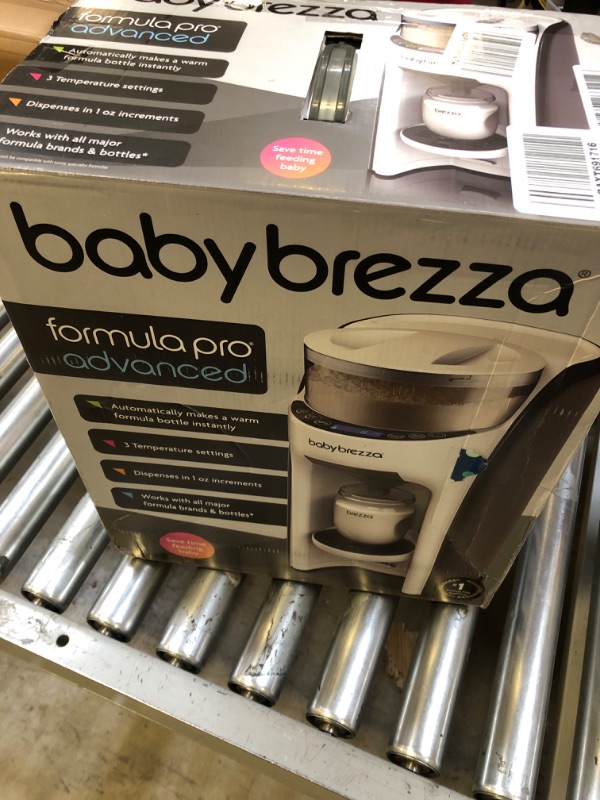 Photo 2 of Baby Brezza New and Improved Formula Pro Advanced Formula Dispenser Machine - Automatically Mix a Warm Formula Bottle Instantly - Easily Make Bottle with Automatic Powder Blending, White Base White