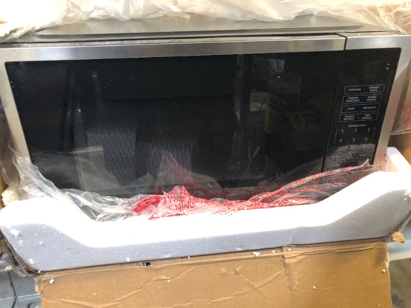 Photo 1 of 0.9 cu. ft. 900-Watt Countertop Microwave in Stainless Steel