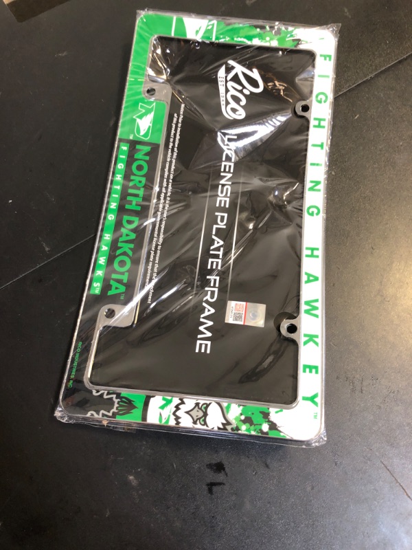 Photo 2 of Rico Industries NCAA North Dakota Fighting Hawks Primary 12" x 6" Chrome All Over Automotive License Plate Frame for Car/Truck/SUV (BENT!)