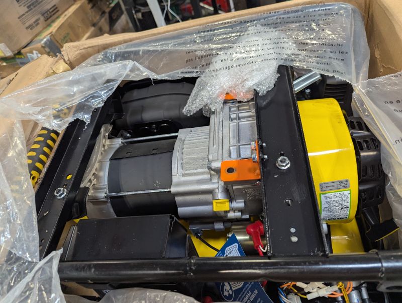 Photo 3 of (Cracked in the front.)  ***************  BE ADVISED************
ampion Power Equipment 4750-Watt Dual Fuel Portable Generator with Electric Start, Wheel Kit