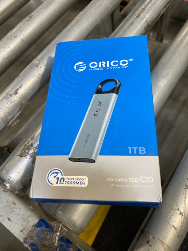 Photo 1 of ORICO 1TB External SSD Up to 1050MB/s, Hanging Hole Design Portable Solid State Drive, USB C&A 2 in 1 Cable, Reliable Storage for Type-C Smartphone, Tablets, Laptops - C10