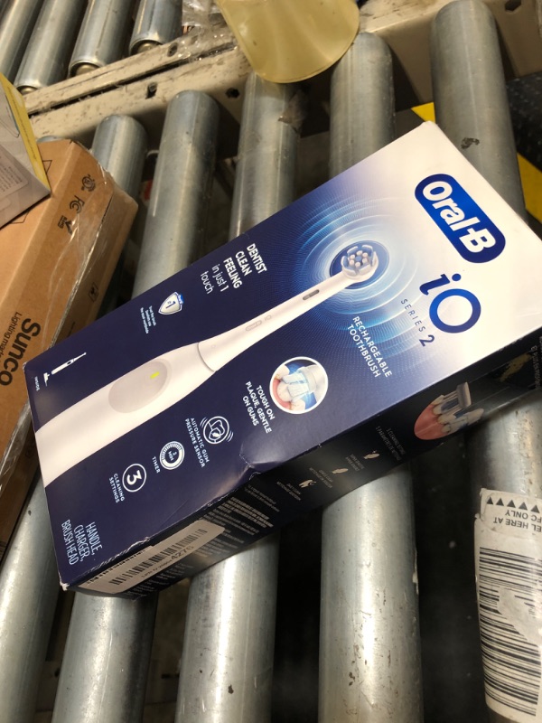 View 2 of Oral-B iO Series 2 Rechargeable Electric Powered Toothbrush, Pure White with 1 Gentle Care Brush Head - Automatic Pressure Sensor to Protect Gums - 3 Modes - 2 Min Timer