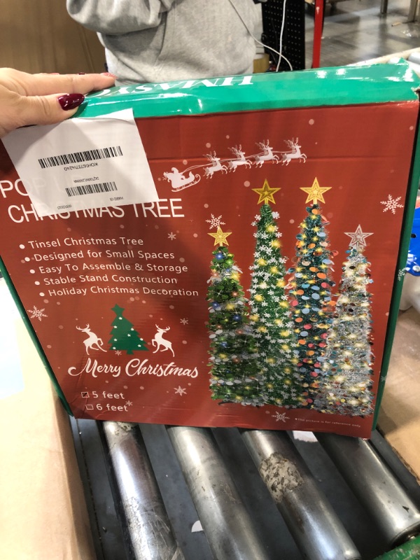 Photo 1 of HMASYO 5 FT Pop Up Christmas Tree with Timer Lights, Sliver Tinsel Christmas Tree, Collapsible Artificial Pencil Christmas Tree for Indoor Home Apartment Porch Holiday Party Decorations