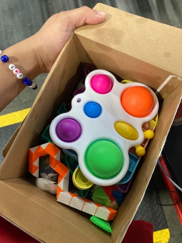 Photo 3 of 50 Pcs Fidget Toys Pack - Stocking Stuffers for Kids, Gifts for Kids, Party Favors - Adults Stress Relief Sensory Toy - ADHD Toys Bulk for Classroom Treasure Box Prizes - Pop Its