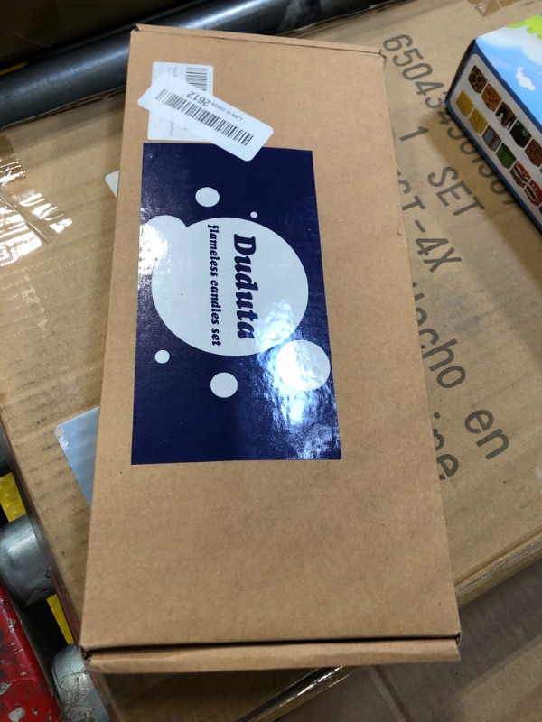 Photo 1 of duduta Red Flickering Flameless Taper Candles with Remote Timer, Battery Operated Christmas LED Candlesticks Set of 12