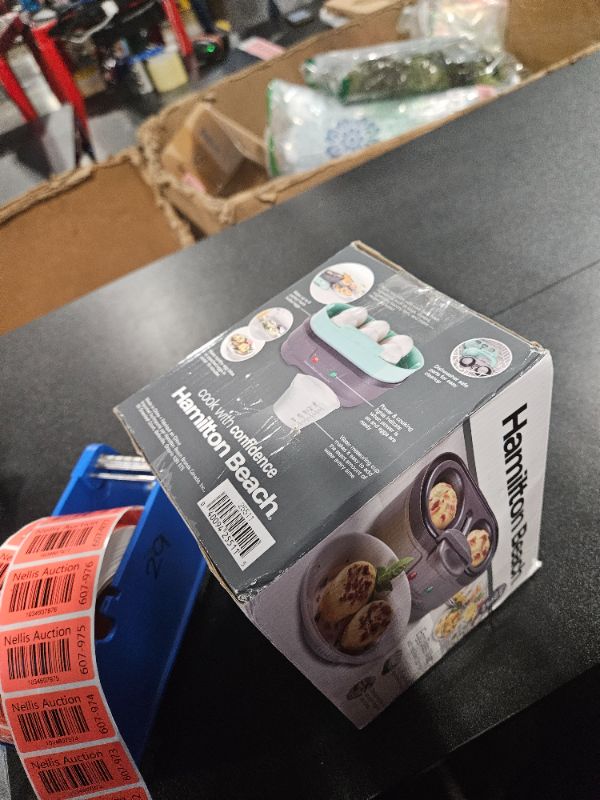 Photo 2 of **USED**
Hamilton Beach Sous Vide Style Electric Egg Bite Maker, Hard Boiled Egg Cooker & Poacher with Removable Nonstick Tray, Makes 2 in Under 10 Minutes, Teal (25511)