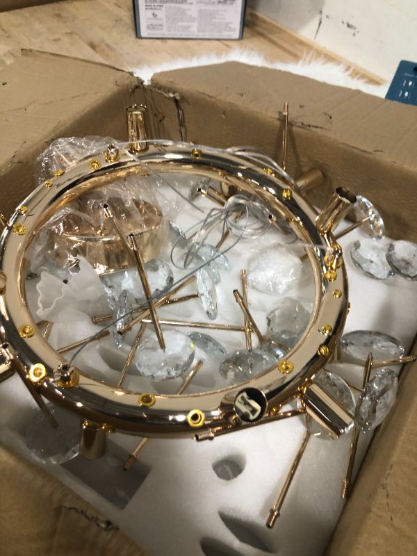 Photo 1 of XIAOQIWU 23.6" Modern Crystal Chandelier Gold Crystal Chandeliers 3-Tier Luxury Crystal Pendant Light 12-Light Ceiling Pendant Lighting for Dinning Room Living Room Foyer