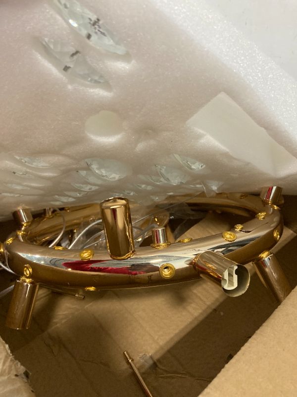 Photo 1 of XIAOQIWU 23.6" Modern Crystal Chandelier Gold Crystal Chandeliers 3-Tier Luxury Crystal Pendant Light 12-Light Ceiling Pendant Lighting for Dinning Room Living Room Foyer