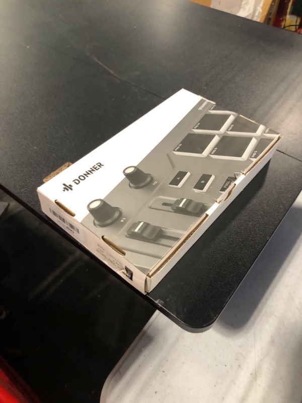 Photo 1 of Donner MIDI Pad Beat Maker Machine Professional, Drum Machine with 16 Beat Pads, 2 Assignable Fader & Knobs and Music Production Software, USB MIDI Controller with 40 Courses, STARRYPAD