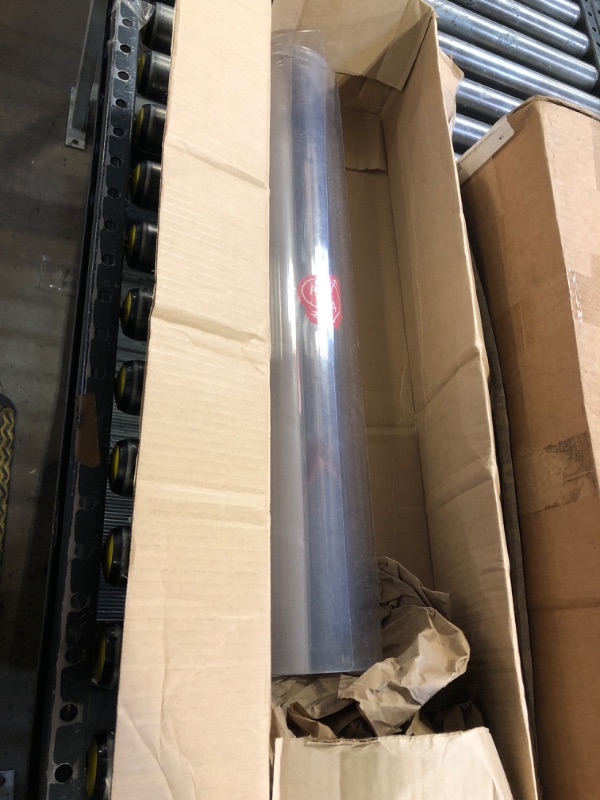 Photo 1 of Royhom Clear Table Protector 2mm Thick, 23 x 47 Inch Clear Table Cover Protector, Plastic Table Cover, Clear Desk Mat Desk Pad, Desk Protector Mat for Writing Desk, Coffee Table, Dining Room Table