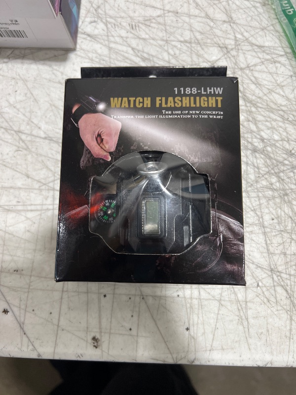 Photo 1 of FLYEEGO LED Tactical Wrist Light Flashlight Portable Rechargeable Wrist Watch Light Wristlight Torch with Compass Best for Running Biking Mountain Climbing Camping Hiking Patrol Hunting