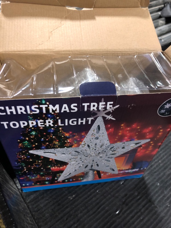 Photo 1 of DG-Direct Christmas Tree Topper Lighted Star [Silver],3D Hollow Sparkling Star Christmas Tree Topper with Rotating Magic Cool White Snowflake Projector for Christmas Tree Ornament (Silver)