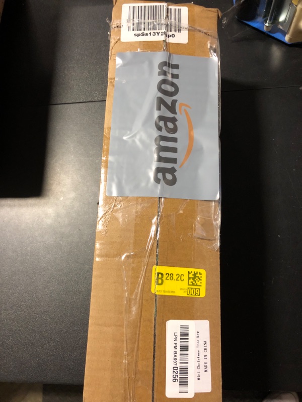 Photo 1 of Mini Christmas Tree with Lights: 2ft Tabletop Christmas Tree, Small Artificial Xmas Tree with Star Treetopper, LED String Light & Hanging Ornaments, for Desk Christmas Decors Home Office Party