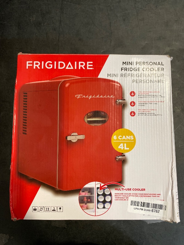 Photo 1 of Frigidaire Red Mini Personal Fridge Cooler, 1 Gal Capacity fits Six Cans, Includes Plugs for Home Outlet & DC Charger - 9.84" D x 7.09" W x 10.35" H