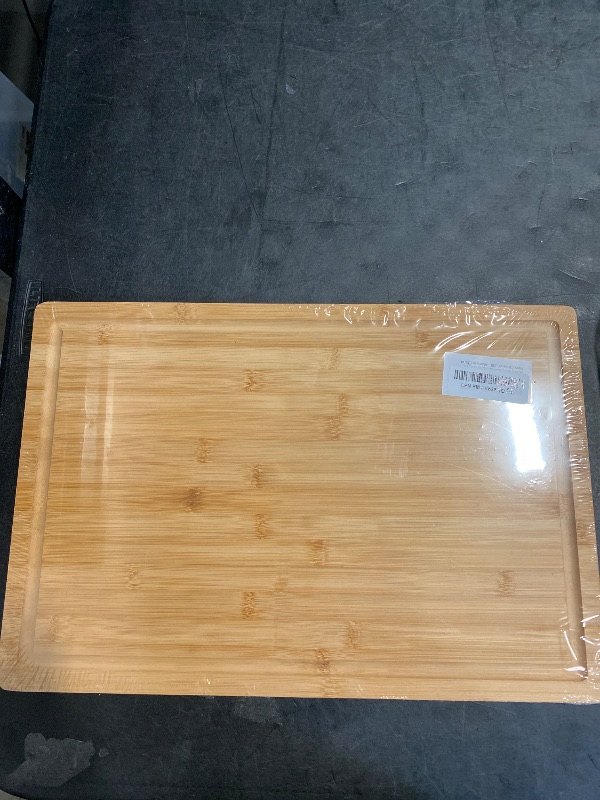 Photo 1 of Bamboo Cutting Board for Kitchen, 18" Large Wood Charcuterie Cheese Board, Wooden Chopping Block with Side Handles and Juice Grooves