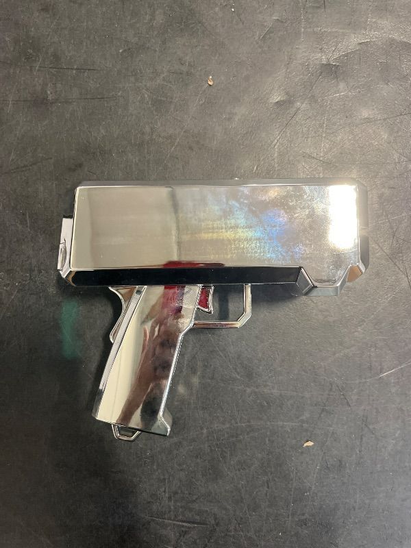 Photo 1 of RUVINCE Money Gun Shooter Money Gun for Movies That Look Real, Prop Gun Make it Rain, Handheld Cash Gun for Game Movies Party