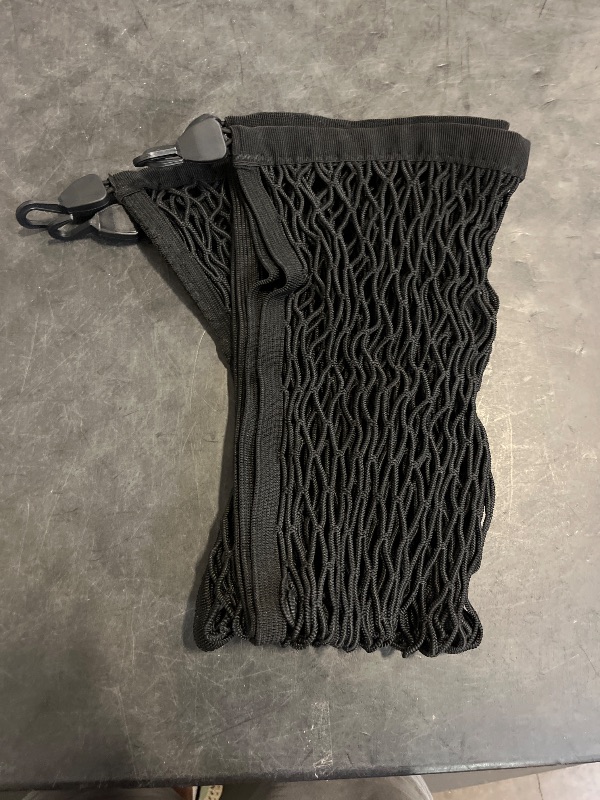 Photo 1 of Premium Quality Adjustable Elastic Cargo Net Universal Stretchable Truck Net with Hooks,Storage Bag for Car, SUV, Truck, Pickup Trucks Black 32x24in