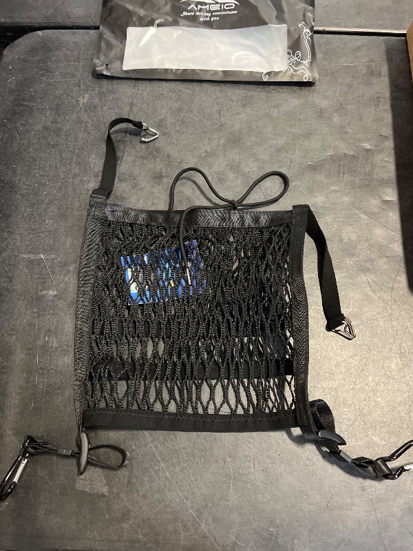 Photo 1 of AMEIQ Car Accessories, Organizer Storage Between Front Seats, Purse Handbag Holder of 3 Layers Mesh Net Pocket Bag, Backseat Dog Pet Barrier, Patented