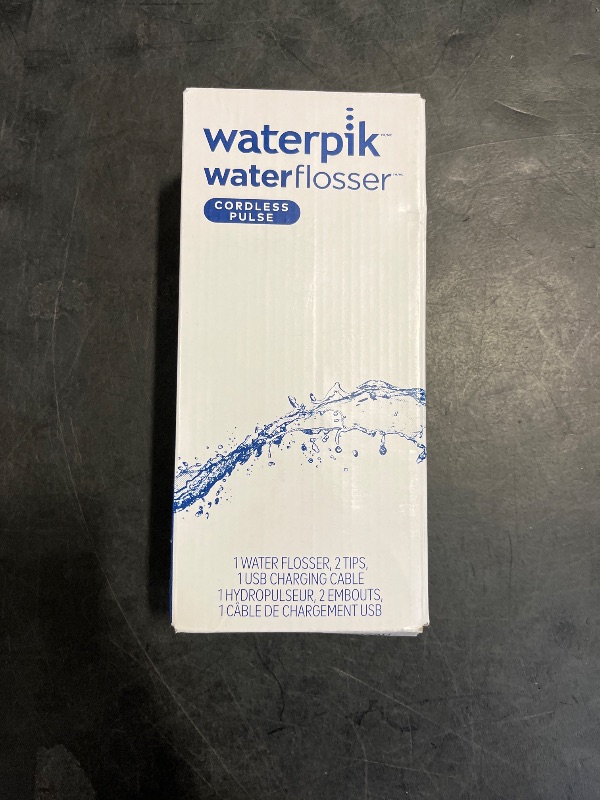 Photo 1 of Waterpik Cordless Pulse Rechargeable Portable Water Flosser for Teeth, Gums, Braces Care and Travel with 2 Flossing Tips, Waterproof, ADA Accepted, WF-20 White, Packaging May Vary