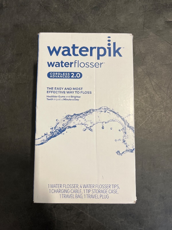 Photo 1 of Waterpik Cordless Advanced 2.0 Water Flosser For Teeth, Gums, Braces, Dental Care With Travel Bag and 4 Tips, ADA Accepted, Rechargeable, Portable, and Waterproof, Blue WP-583, Packaging May Vary