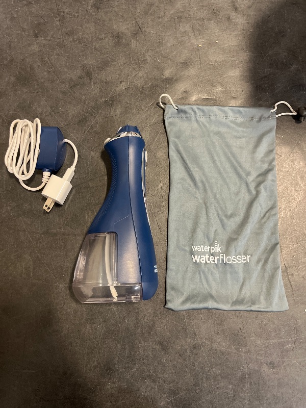 Photo 1 of Waterpik Cordless Advanced 2.0 Water Flosser For Teeth, Gums, Braces, Dental Care With Travel Bag and 4 Tips, ADA Accepted, Rechargeable, Portable, and Waterproof, Blue WP-583, Packaging May Vary