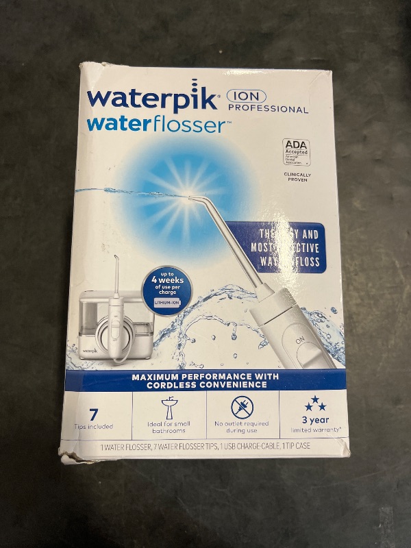 Photo 1 of Waterpik ION Professional Water Flosser, Rechargeable and Portable for Teeth, Gums, Braces, 10 Settings, 7 Flossing Tips For Multiple Users And Needs, ADA Accepted, WF-12 White, Packaging May Vary