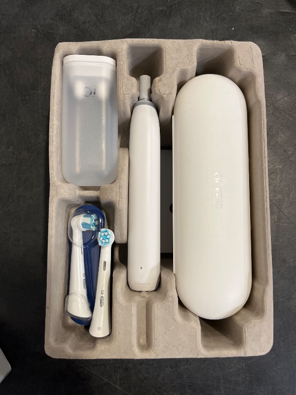 Photo 1 of Oral-B iO Deep Clean Rechargeable Electric Powered Toothbrush, White with iO Series 3 Limited, 2 Brush Heads and Travel Case - Pressure Sensor to Protect Gums - 3 Cleaning Settings - 2 Minute Timer