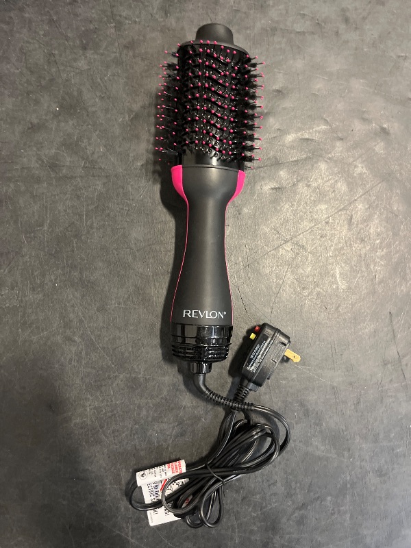 Photo 1 of REVLON One-Step Volumizer Hair Dryer and Styler, Improved Motor for Less Frizz, More Shine, and Reduced Heat Damage for Salon Style Round Brush for Blowout, Black (Amazon Exclusive)