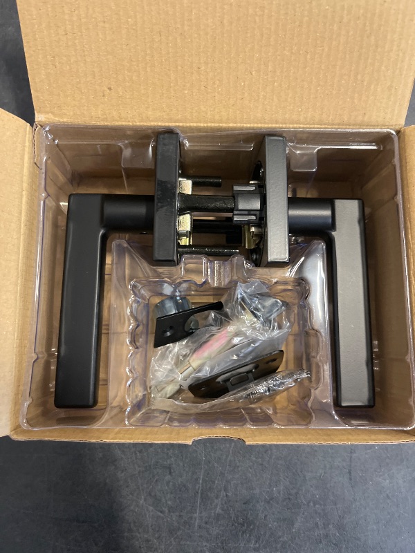 Photo 1 of Kwikset Halifax Interior Passage Door Handle, Lever For Closet and Hallway Doors, Reversible Non-Locking Handle Lever, Matte Black, with Microban Protection, Square Rose