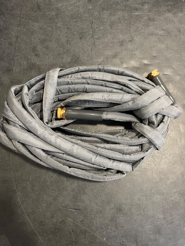 Photo 1 of Toolasin Garden Hose 50ft, Non-Expanding, Lightweight, Leak-Proof Metal interface, No-Knots, Portable, Wear-Resistant, Sturdy, Flexible, 3/4GHT, Water Hose for Yard, Garden, Black Green