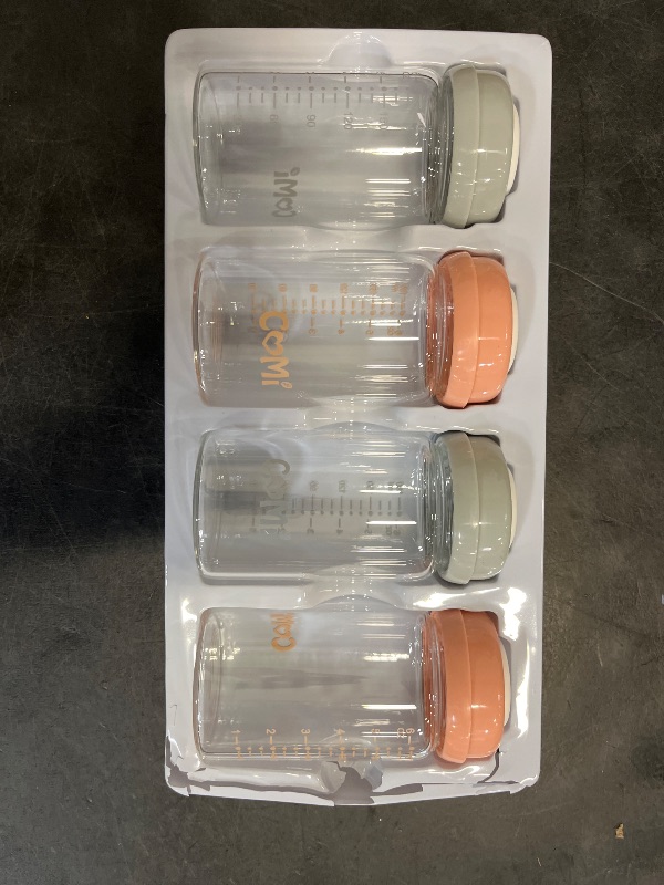 Photo 1 of COMI Wide Neck Glass Breastmilk Collection n Storage Bottle, 4 Packs, 6oz with Screw Ring Sealing Disk; Re-markable Sealing Disc. BPA Free, Fits Breast Pumps & Nipples (2 Gray Lids + 2 Pink Lids)