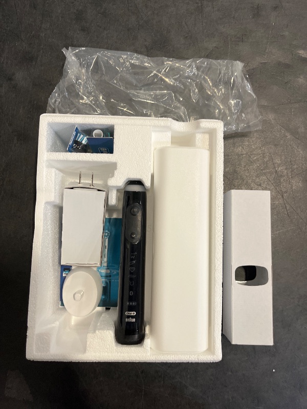 Photo 1 of Oral-B Pro Smart Limited Power Rechargeable Electric Toothbrush with (2) Brush Heads and Travel Case, Black
