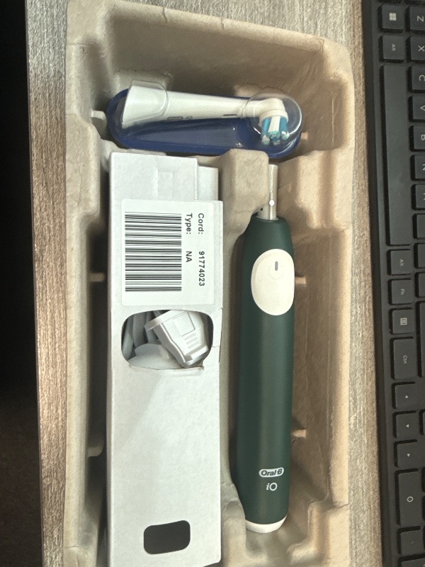 Photo 1 of Oral-B iO Series 2 Rechargeable Electric Powered Toothbrush Starter Kit, Forest Green with 2 Brush Heads - Automatic Pressure Sensor to Protect Gums - 3 Modes - 2 Min Timer