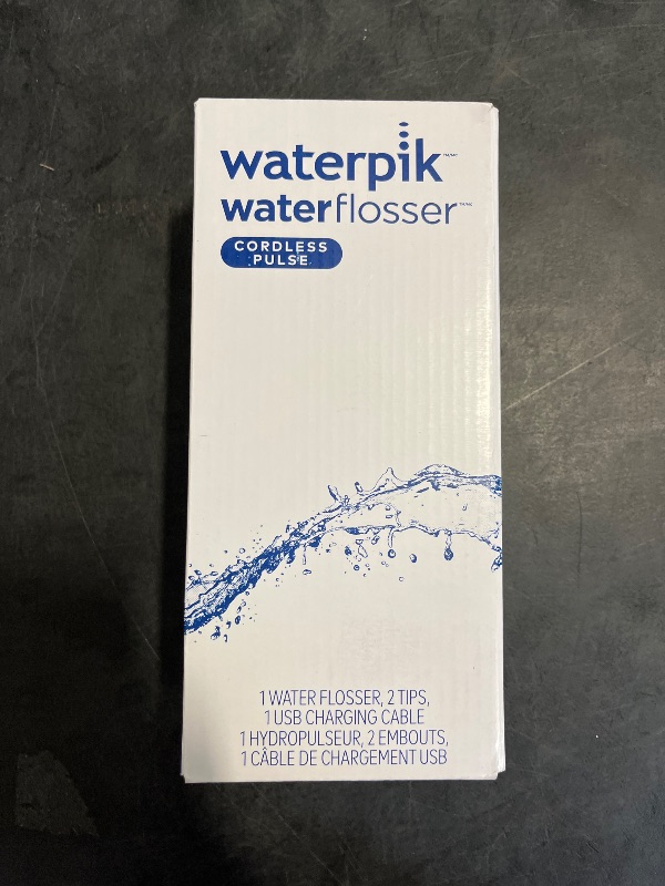 Photo 1 of Waterpik Cordless Pulse Rechargeable Portable Water Flosser for Teeth, Gums, Braces Care and Travel with 2 Flossing Tips, Waterproof, ADA Accepted, WF-20 White, Packaging May Vary