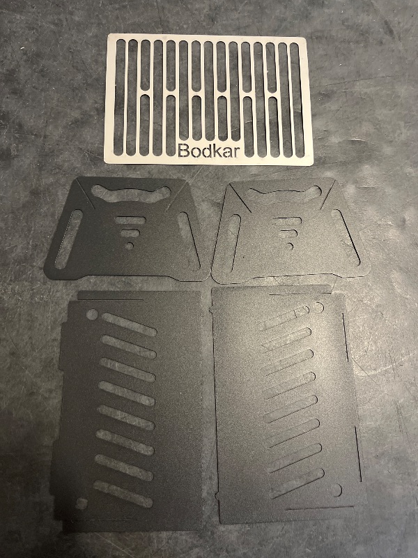 Photo 1 of Bodkar Charcoal Grill, Portable BBQ Smoker - Lightweight Tabletop Outdoor Grill for Camping, Picnics, Garden, Beach Parties - 6"*4.6"*4.9