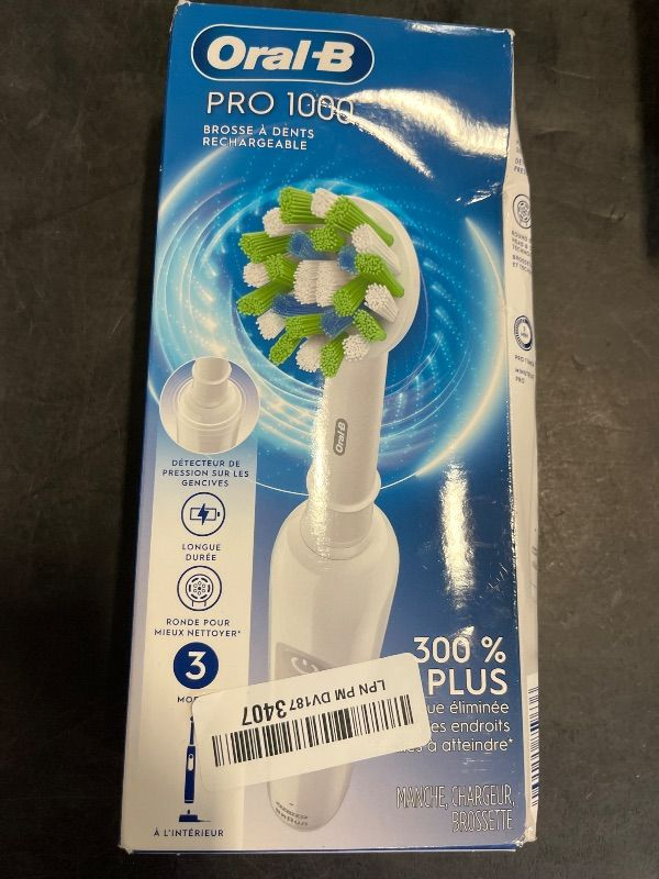 Photo 1 of Oral-B Pro 1000 Rechargeable Electric Toothbrush, White