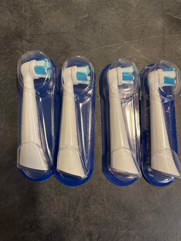 Photo 1 of Oral-B iO Series Ultimate Clean Electric Toothbrush Replacement Brush Heads for an Oral-B Electric Toothbrush, 4 Count, White