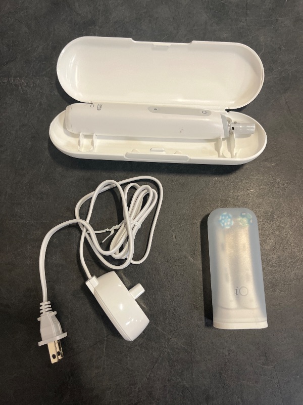 Photo 1 of Oral-B iO Deep Clean Rechargeable Electric Powered Toothbrush, White with iO Series 3 Limited, 2 Brush Heads and Travel Case - Pressure Sensor to Protect Gums - 3 Cleaning Settings - 2 Minute Timer
